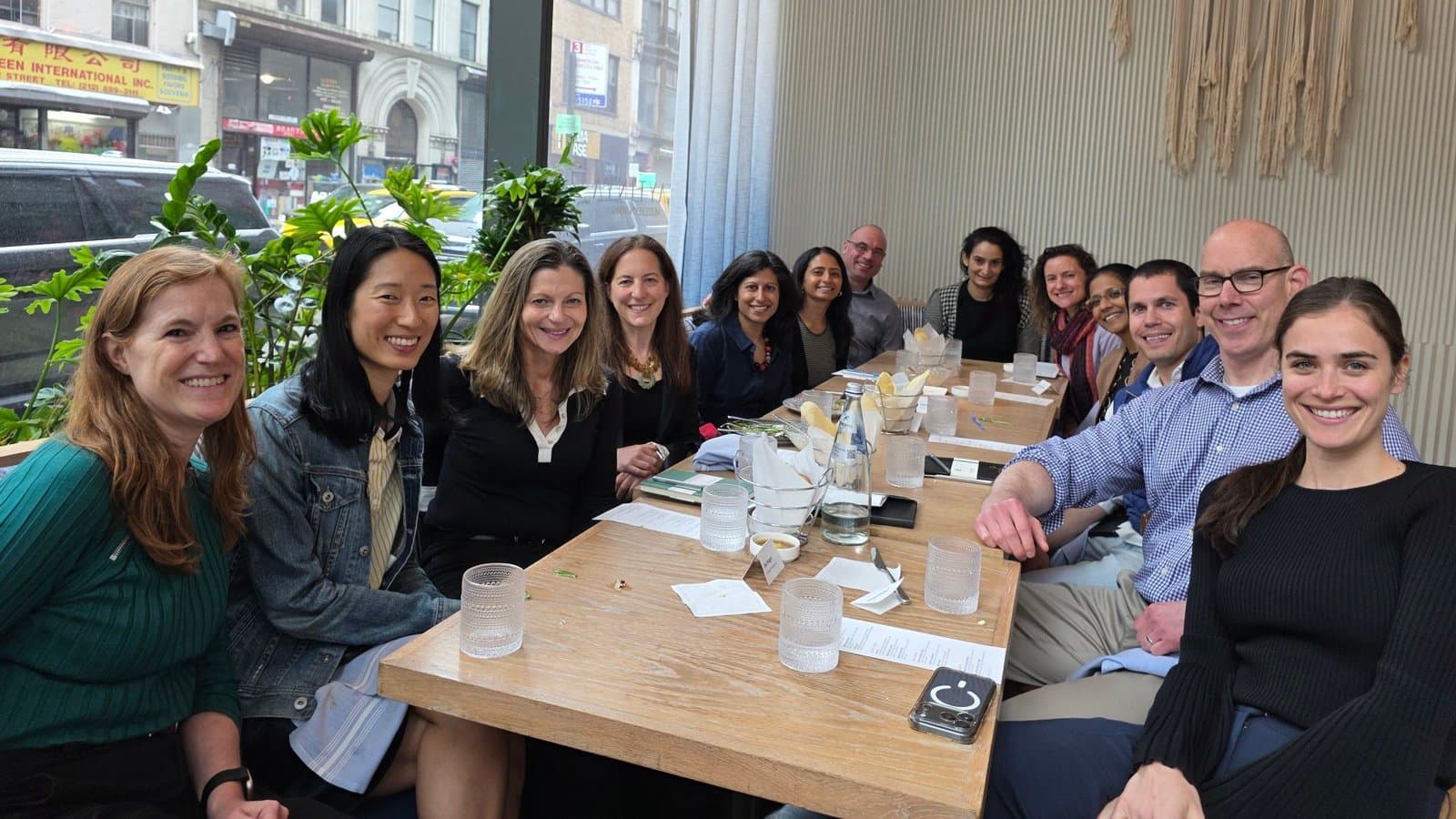 General counsel and legal leaders gathered around a long table at the Coheso NYC GC lunch at Zaytinya